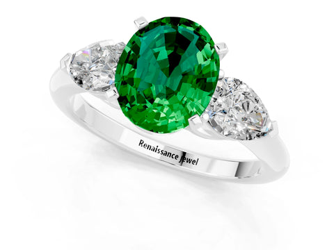 White gold Three-Stone Oval Cut Emerald Ring with Pear Side Stones and Four-Prong Setting_1