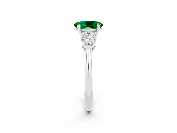 Silver Three-Stone Oval Cut Emerald Ring with Pear Side Stones and Four-Prong Setting