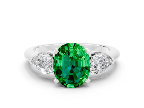 White gold Three-Stone Oval Cut Emerald Ring with Pear Side Stones and Four-Prong Setting