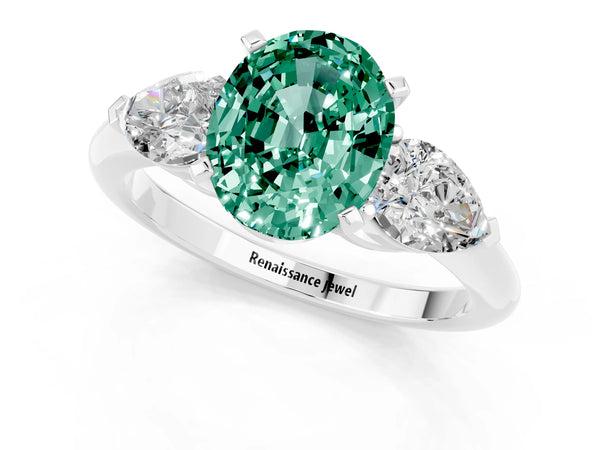 Platinum Three-Stone Oval Cut Green Sapphire Ring with Pear Side Stones and Four-Prong Setting