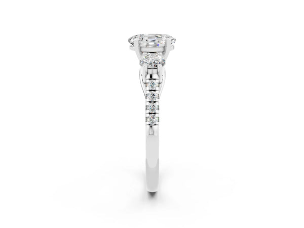 Platinum Three-Stone Oval Cut Moissanite Pavé Band with Four-Prong Setting