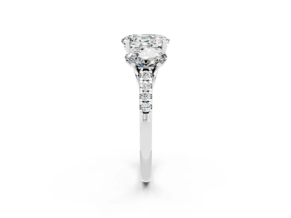 Platinum Three-Stone Oval Cut Moissanite Ring with Round  Pavé Band and Prong Setting