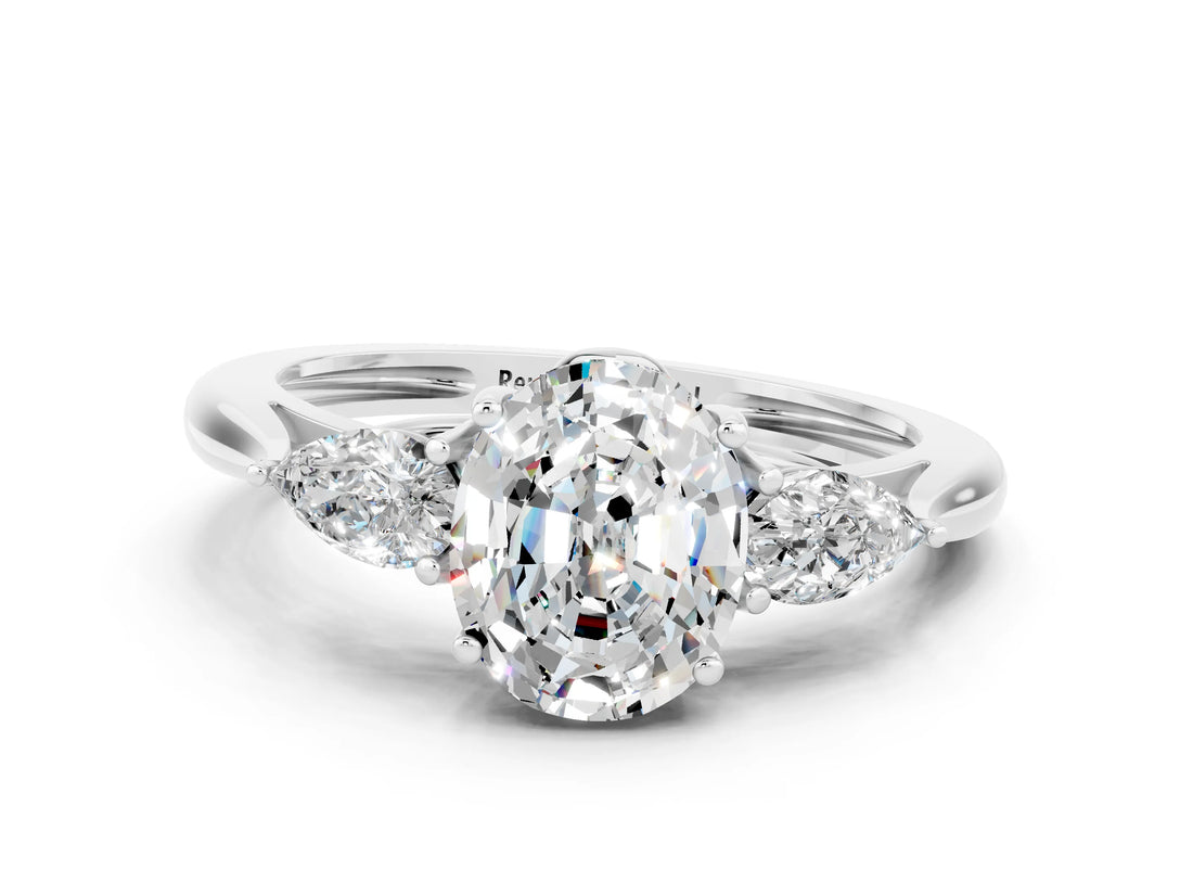 White gold Three-Stone Oval Cut Moissanite Ring with Pear  Side Stones in Four-Prong Setting_12