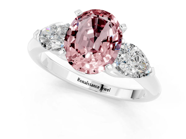 Silver Three-Stone Oval Cut Morganite Ring with Pear Side Stones and Four-Prong Setting