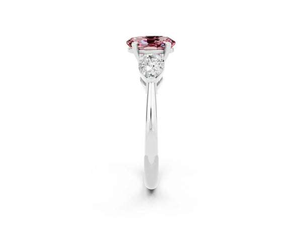 Platinum Three-Stone Oval Cut Morganite Ring with Pear Side Stones and Four-Prong Setting