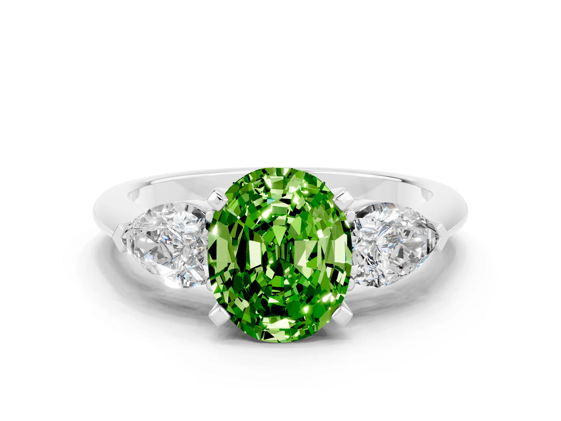 White gold Three-Stone Oval Cut Peridot Ring with Pear Side Stones and Four-Prong Setting
