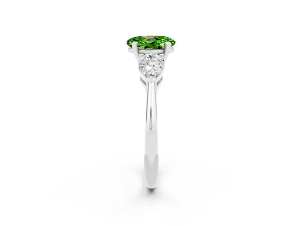 Silver Three-Stone Oval Cut Peridot Ring with Pear Side Stones and Four-Prong Setting