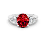 White gold Three-Stone Oval Cut Ruby Ring with Pear Side Stones and Four-Prong Setting