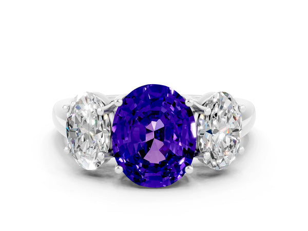 Platinum Three-Stone Oval Cut Tanzanite Engagement Ring with Prong Setting