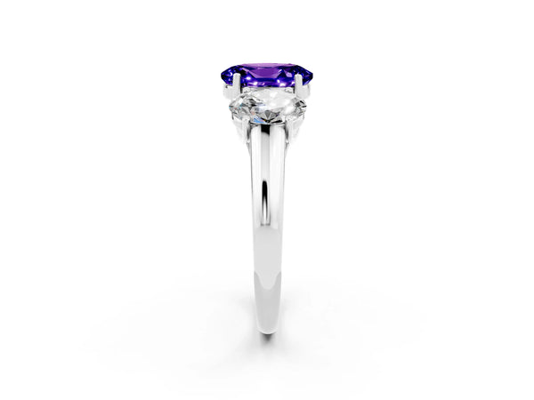 Platinum Three-Stone Oval Cut Tanzanite Engagement Ring with Prong Setting