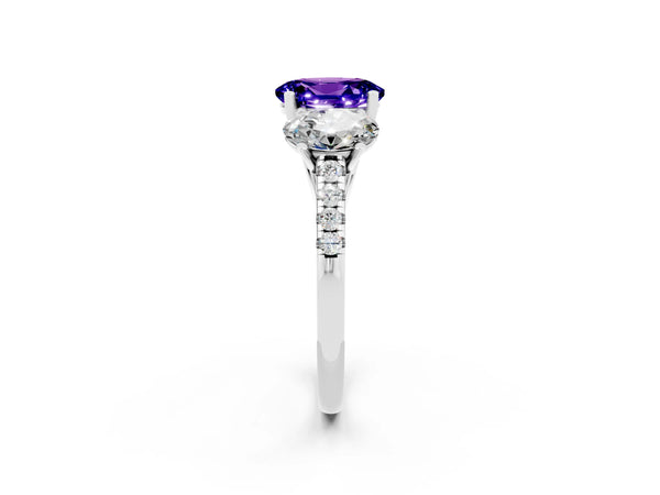 Silver Three-Stone Oval Cut Tanzanite Ring with Round  Pavé Band and Prong Setting
