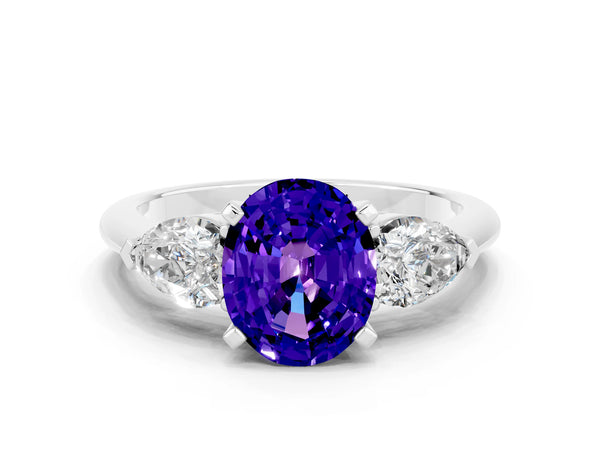 Platinum Three-Stone Oval Cut Tanzanite Ring with Pear Side Stones and Four-Prong Setting