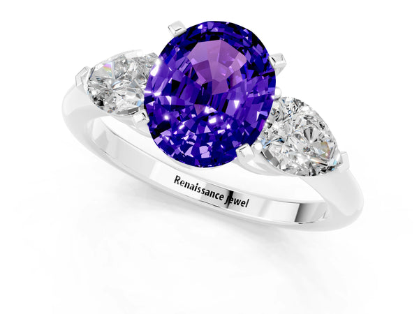 Platinum Three-Stone Oval Cut Tanzanite Ring with Pear Side Stones and Four-Prong Setting