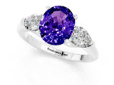 White gold Three-Stone Oval Cut Tanzanite Ring with Pear Side Stones and Four-Prong Setting_1