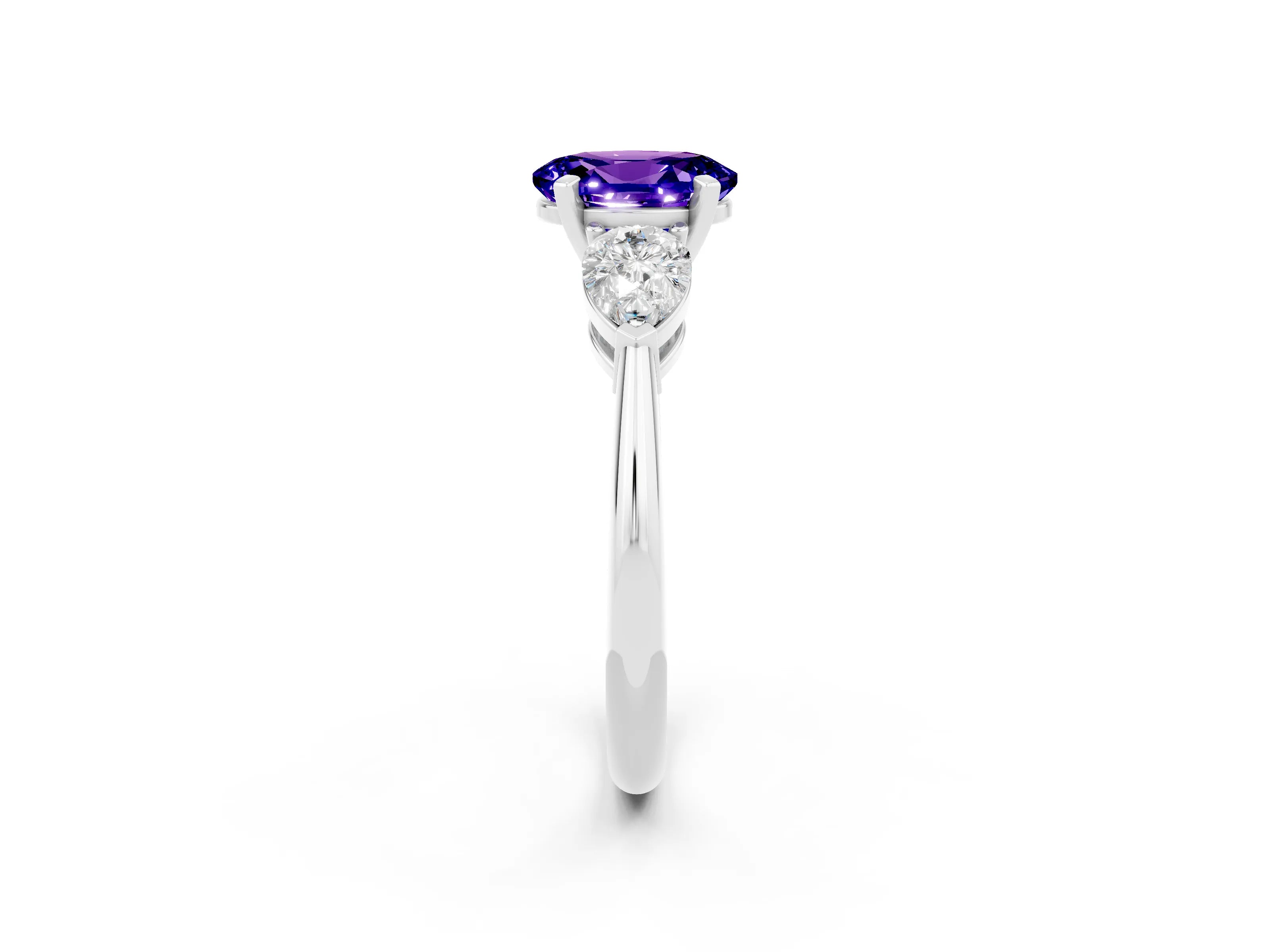 White gold Three-Stone Oval Cut Tanzanite Ring with Pear Side Stones and Four-Prong Setting_2