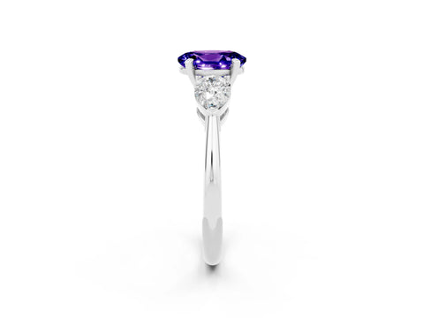 White gold Three-Stone Oval Cut Tanzanite Ring with Pear Side Stones and Four-Prong Setting_2