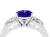 White gold Three-Stone Oval Cut Tanzanite Ring with Pear Side Stones and Four-Prong Setting_4