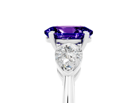 White gold Three-Stone Oval Cut Tanzanite Ring with Pear Side Stones and Four-Prong Setting_5
