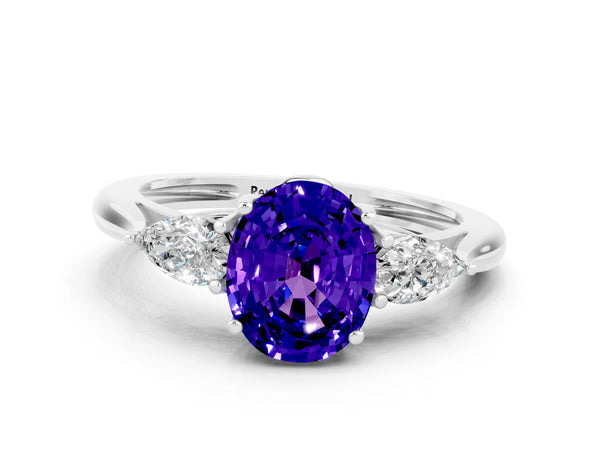 White gold Three-Stone Oval Cut Tanzanite Ring with Pear  Side Stones in Four-Prong Setting
