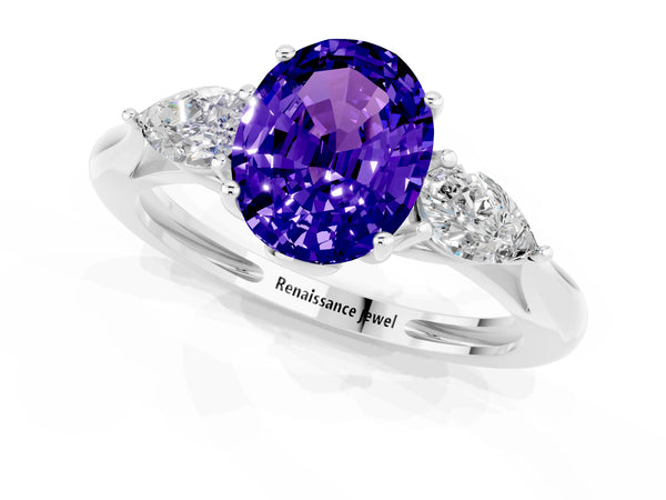Platinum Three-Stone Oval Cut Tanzanite Ring with Pear  Side Stones in Four-Prong Setting