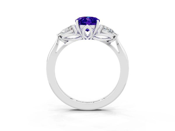 Silver Three-Stone Oval Cut Tanzanite Ring with Pear  Side Stones in Four-Prong Setting