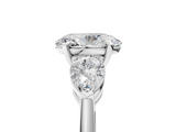 White gold Three-Stone Oval Diamond Ring with Pear Side Stones in Four-Prong Setting_95