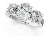 White gold Three-Stone Oval Diamond Ring with Round Side Stones, Classic Band, and Four-Prong Setting_46