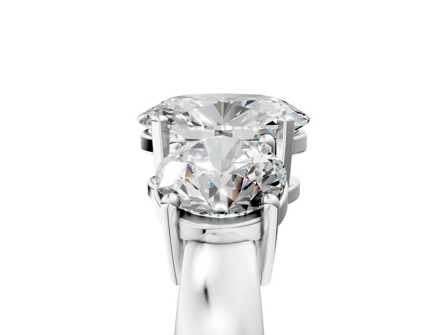 White gold Three-Stone Oval Diamond Ring with Round Side Stones, Classic Band, and Four-Prong Setting