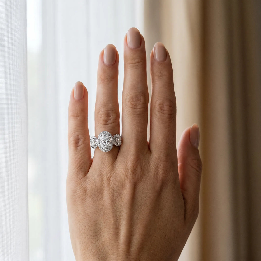 White gold Three-Stone Oval Halo Diamond Ring with Pave Band and Four-Prong Setting_24