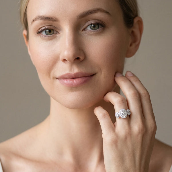 White gold Three-Stone Oval Halo Diamond Ring with Pave Band and Four-Prong Setting