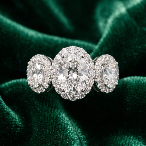 White gold Three-Stone Oval Halo Diamond Ring with Pave Band and Four-Prong Setting