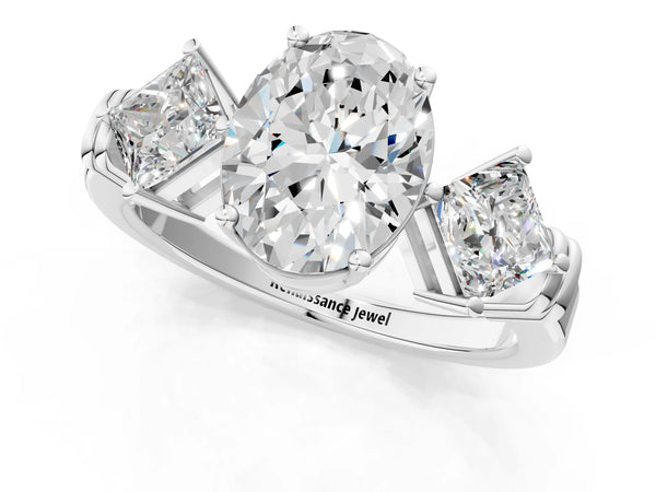 White gold Three-Stone Oval and Princess Cut Diamond Ring with Channel Band and Four-Prong Setting