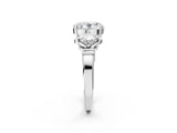 White gold Three-Stone Oval and Princess Cut Diamond Ring with Channel Band and Four-Prong Setting_30