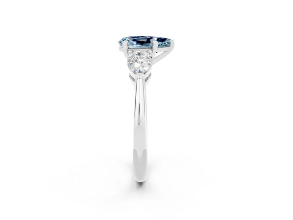 White gold Three-Stone Pear Cut Aquamarine Ring with Pear Side Stones and Four-Prong Setting