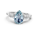 White gold Three-Stone Pear Cut Aquamarine Ring with Pear  Side Stones in Four-Prong Setting_12
