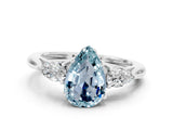 White gold Three-Stone Pear Cut Aquamarine Ring with Pear  Side Stones in Four-Prong Setting_48