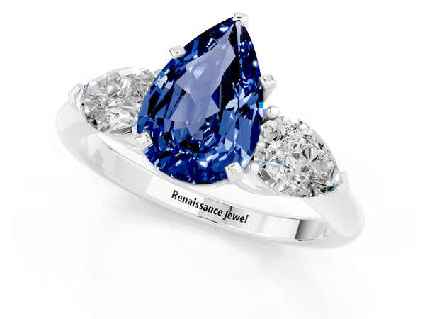 Silver Three-Stone Pear Cut Blue Sapphire Ring with Pear Side Stones and Four-Prong Setting