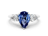 White gold Three-Stone Pear Cut Blue Sapphire Ring with Pear Side Stones and Four-Prong Setting