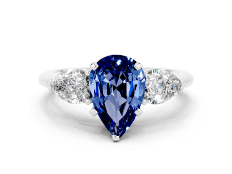 White gold Three-Stone Pear Cut Blue Sapphire Ring with Pear Side Stones and Four-Prong Setting