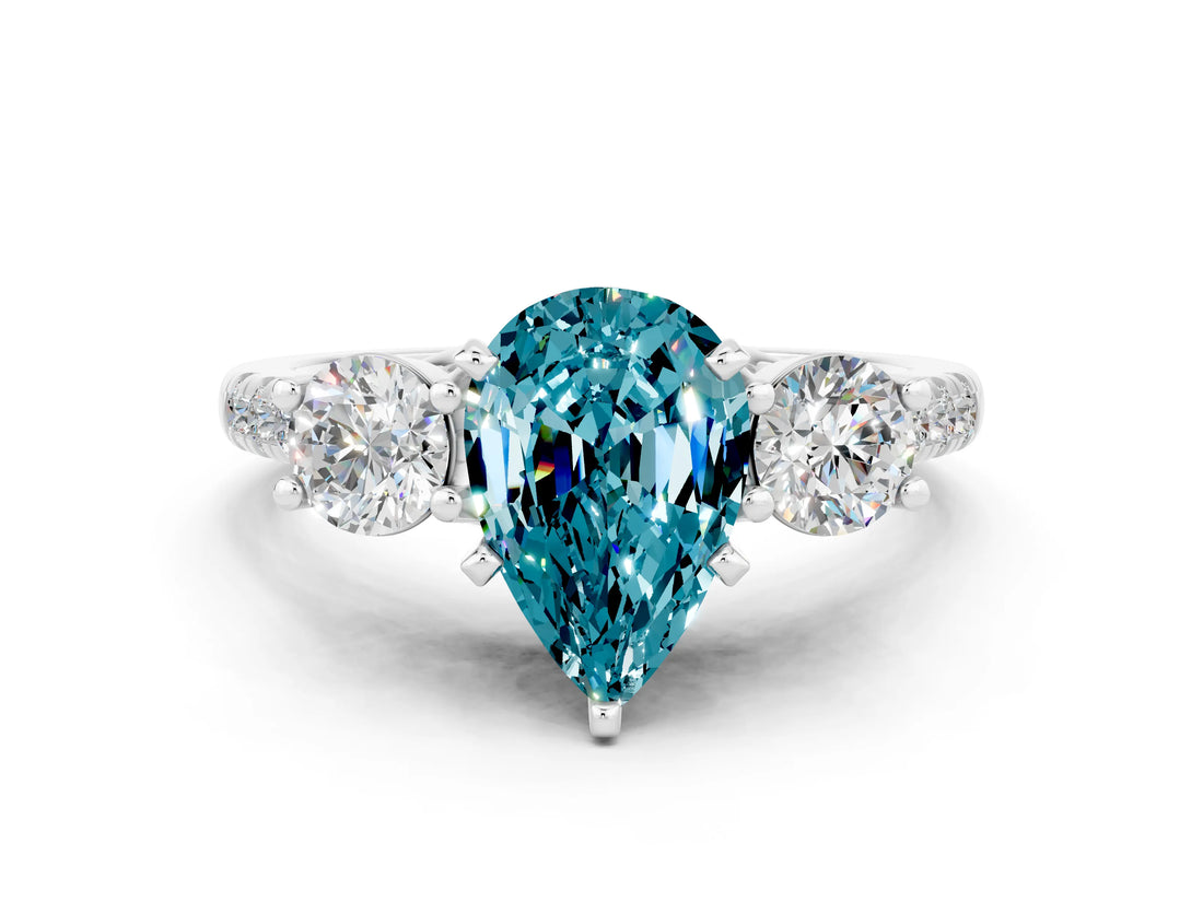 White gold Three-Stone Pear Cut Blue Topaz Pavé Band with Four-Prong Setting