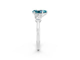 White gold Three-Stone Pear Cut Blue Topaz Ring with Pear Side Stones and Four-Prong Setting_2