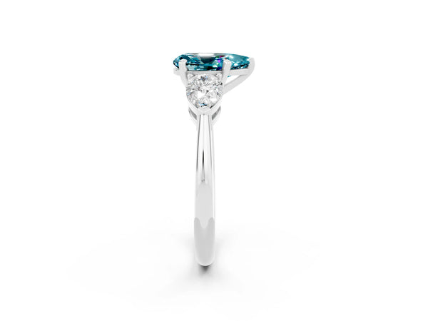 White gold Three-Stone Pear Cut Blue Topaz Ring with Pear Side Stones and Four-Prong Setting