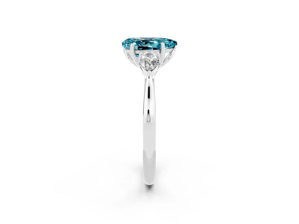 Platinum Three-Stone Pear Cut Blue Topaz Ring with Pear  Side Stones in Four-Prong Setting