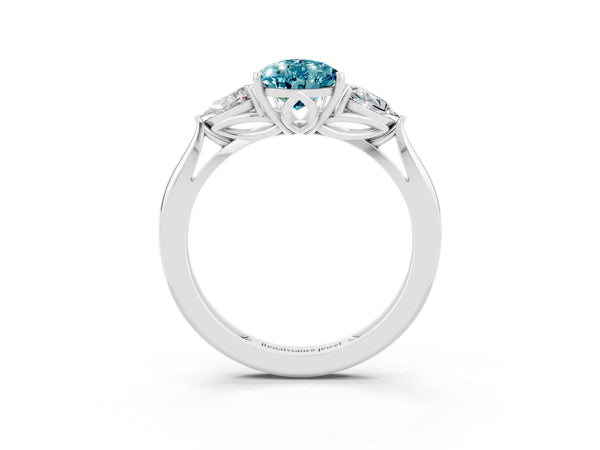 Platinum Three-Stone Pear Cut Blue Topaz Ring with Pear  Side Stones in Four-Prong Setting