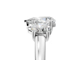 White gold Three-Stone Pear Cut Cut Diamond Ring with Channel Set Band and Four-Prong Setting_55