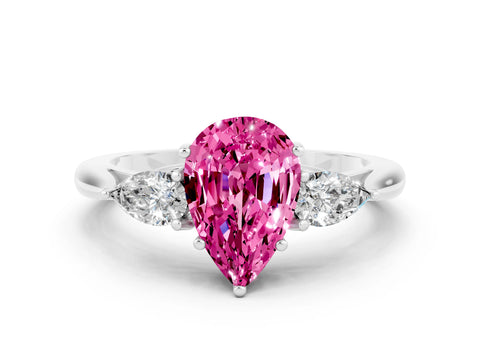 White gold Three-Stone Pear Cut Cut Diamond Ring with Pear Side Stones in Four-Prong Setting