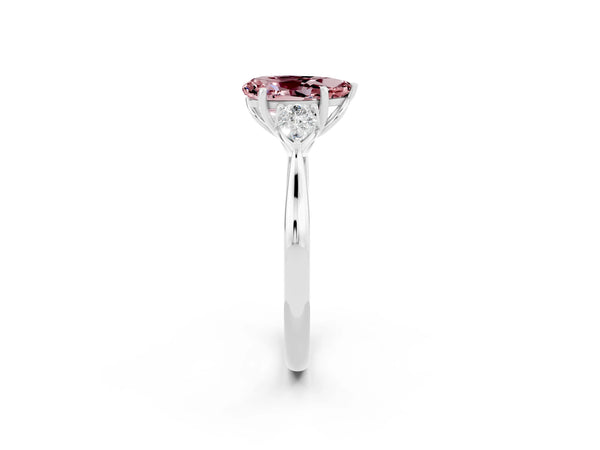 White gold Three-Stone Pear Cut Cut Diamond Ring with Pear Side Stones in Four-Prong Setting