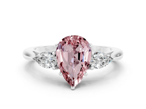 White gold Three-Stone Pear Cut Cut Diamond Ring with Pear Side Stones in Four-Prong Setting