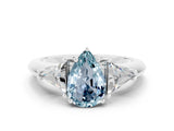 White gold Three-Stone Pear Cut Cut Diamond Ring with Trillion Side Stones and Four-Prong Setting