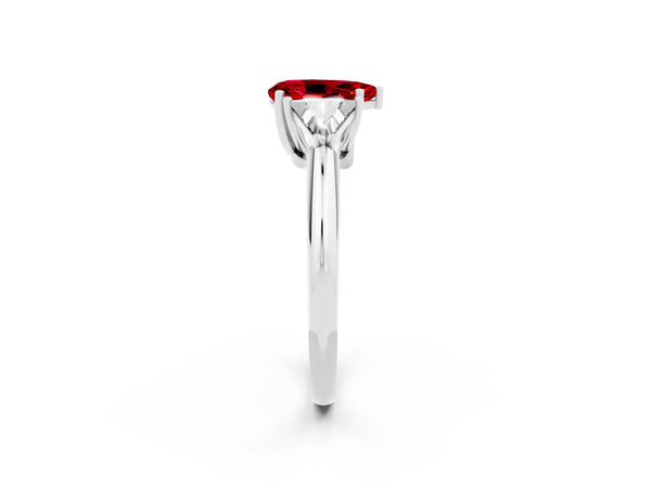 Platinum Three-Stone Pear Cut Cut Diamond Ring with Trillion Side Stones and Four-Prong Setting